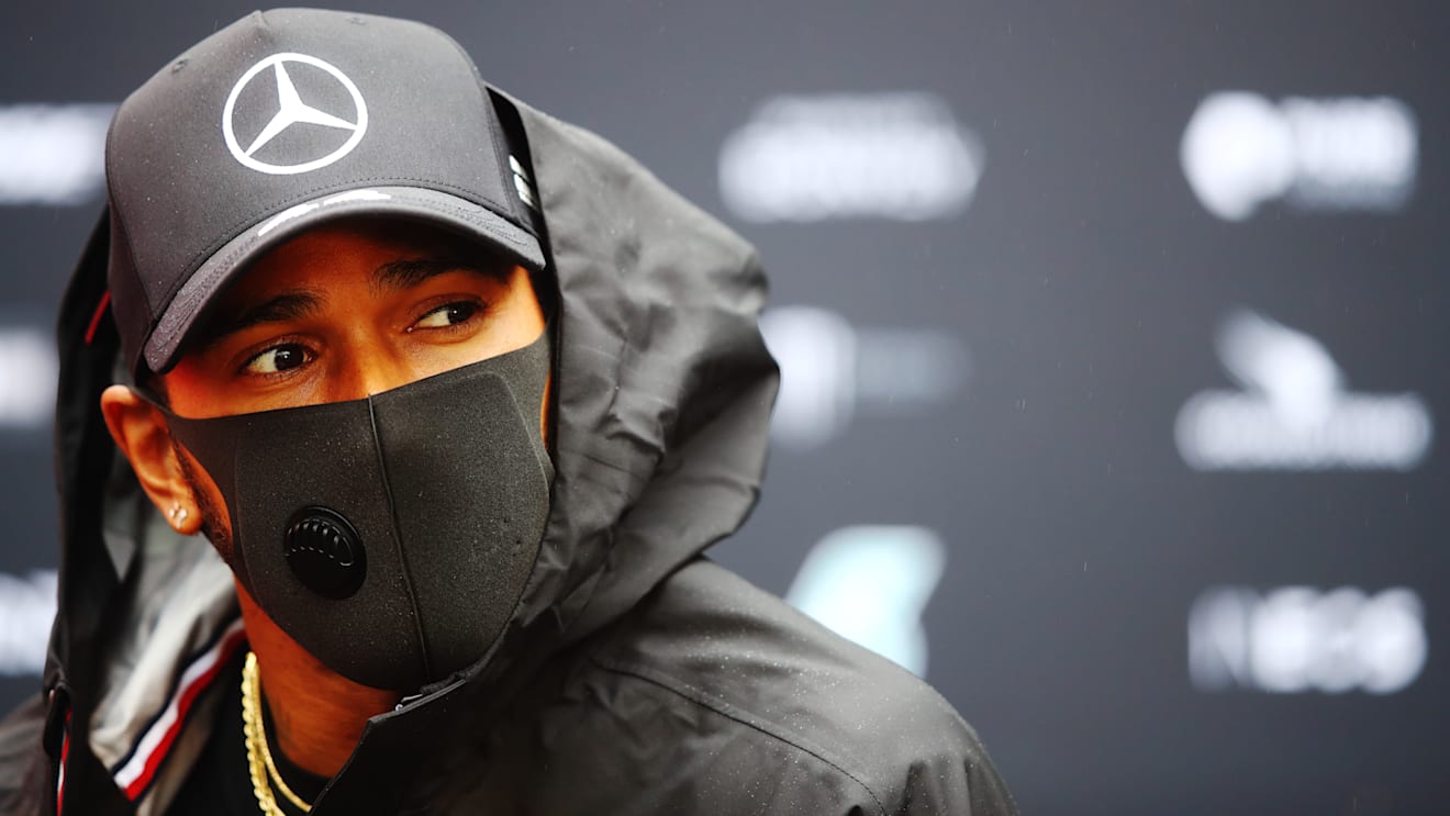 NUERBURG, GERMANY - OCTOBER 08: Lewis Hamilton of Great Britain and Mercedes GP looks on in the Paddock during previews ahead of the F1 Eifel Grand Prix at Nuerburgring on October 08, 2020 in Nuerburg, Germany. (Photo by Mark Thompson/Getty Images)