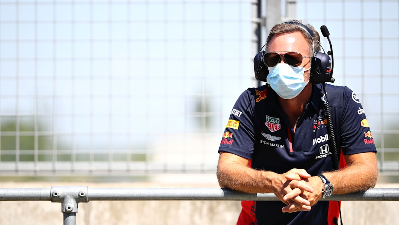Red Bull Racing Team Principal Christian Horner looks on in the pitlane during the filming day