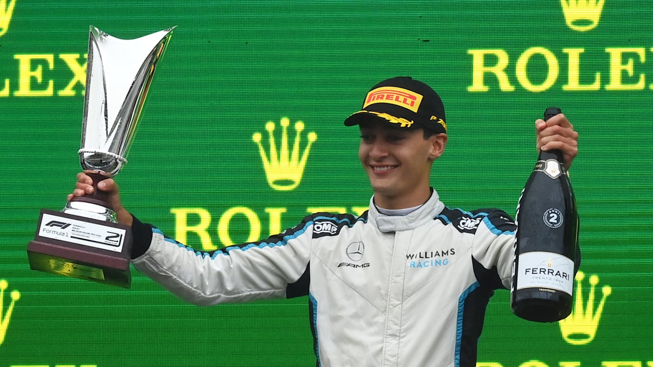 SPA, BELGIUM - AUGUST 29: Second placed George Russell of Great Britain and Williams celebrates on the podium during the F1 Grand Prix of Belgium at Circuit de Spa-Francorchamps on August 29, 2021 in Spa, Belgium. (Photo by Dan Mullan/Getty Images)