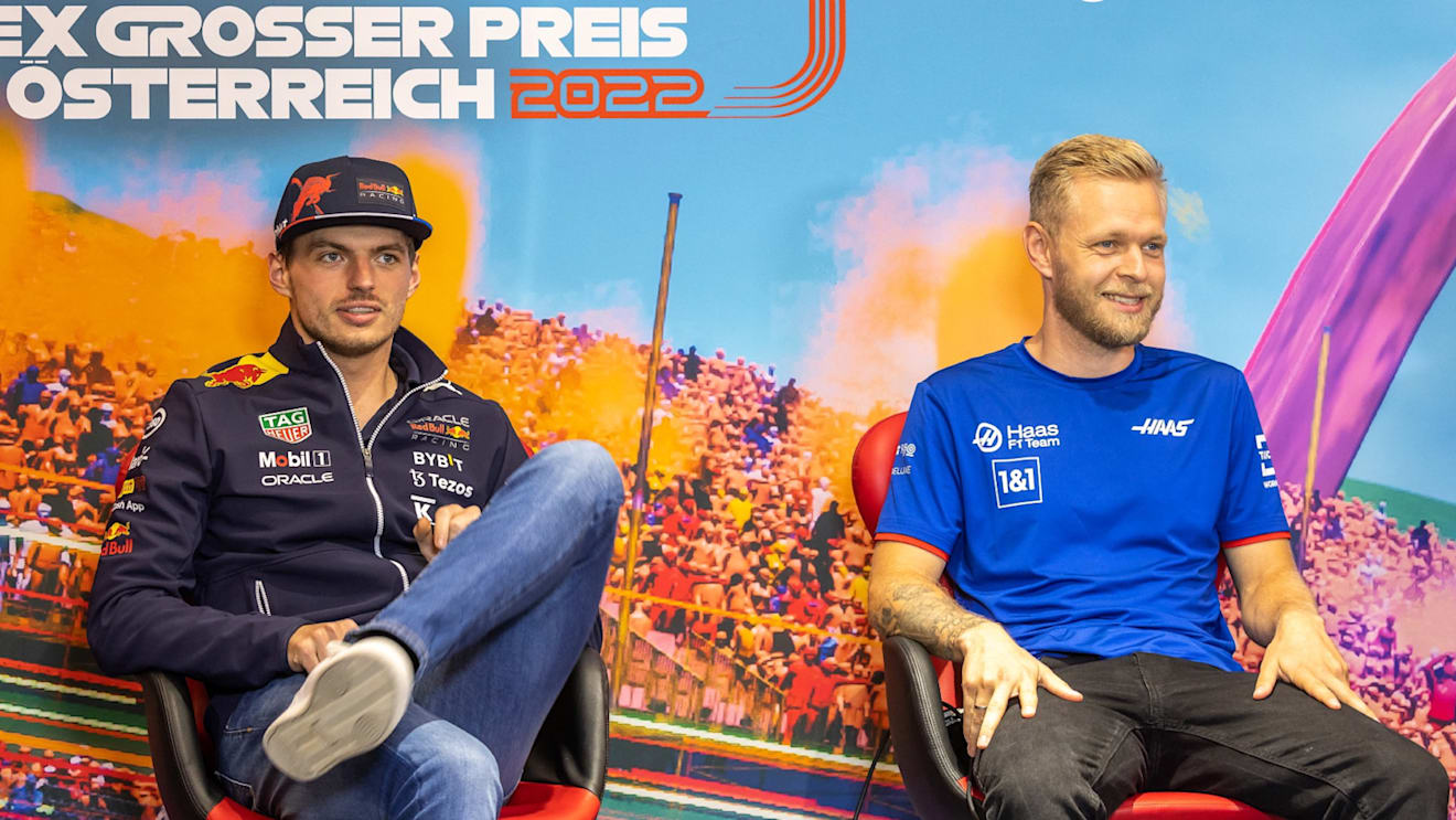 Red Bull's Dutch driver Max Verstappen (L) and Haas' Danish driver Kevin Magnussen address a press conference on July 7, 2022 prior to the Formula One Austrian Grand Prix in Spielberg, Austria. - Austria OUT (Photo by Johann GRODER / various sources / AFP) / Austria OUT (Photo by JOHANN GRODER/EXPA/AFP via Getty Images)