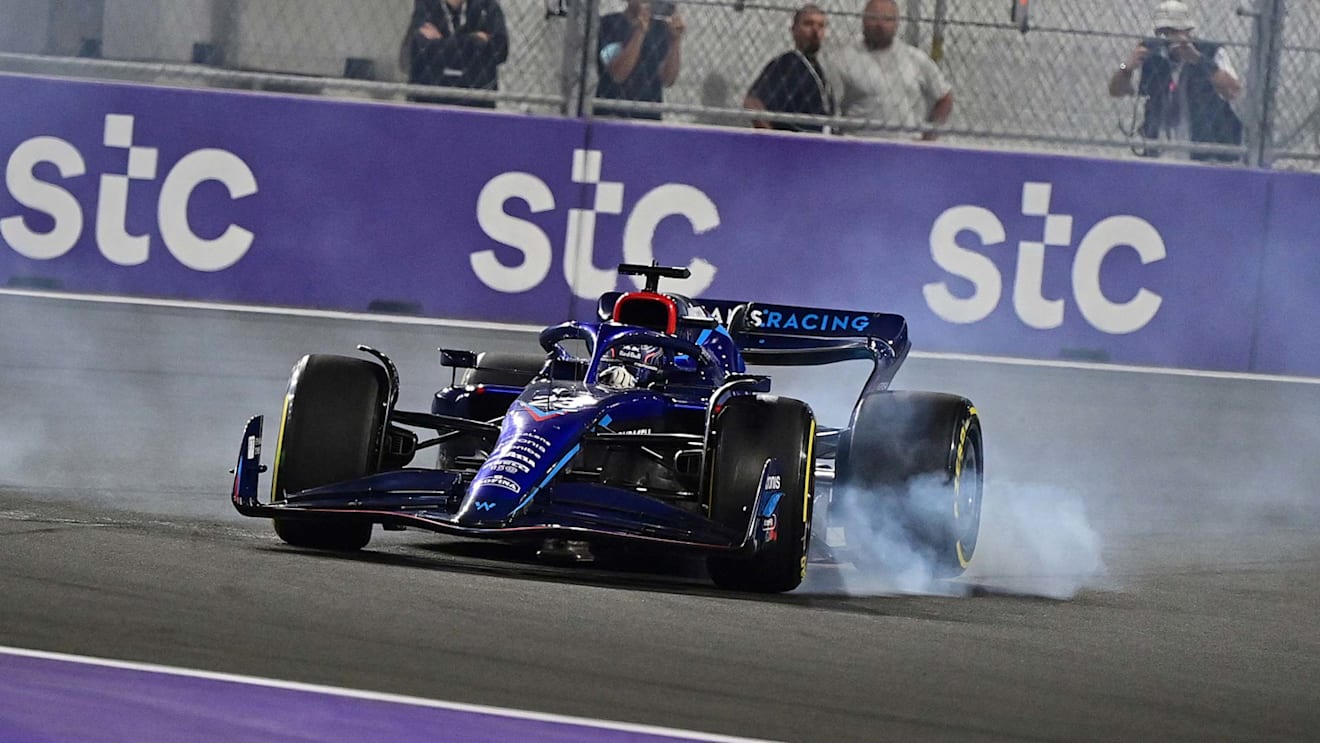 Williams' Thai driver Alex Albon locks his brakes during the 2022 Saudi Arabia Formula One Grand Prix at the Jeddah Corniche Circuit on March 27, 2022. (Photo by ANDREJ ISAKOVIC / AFP) (Photo by ANDREJ ISAKOVIC/AFP via Getty Images)