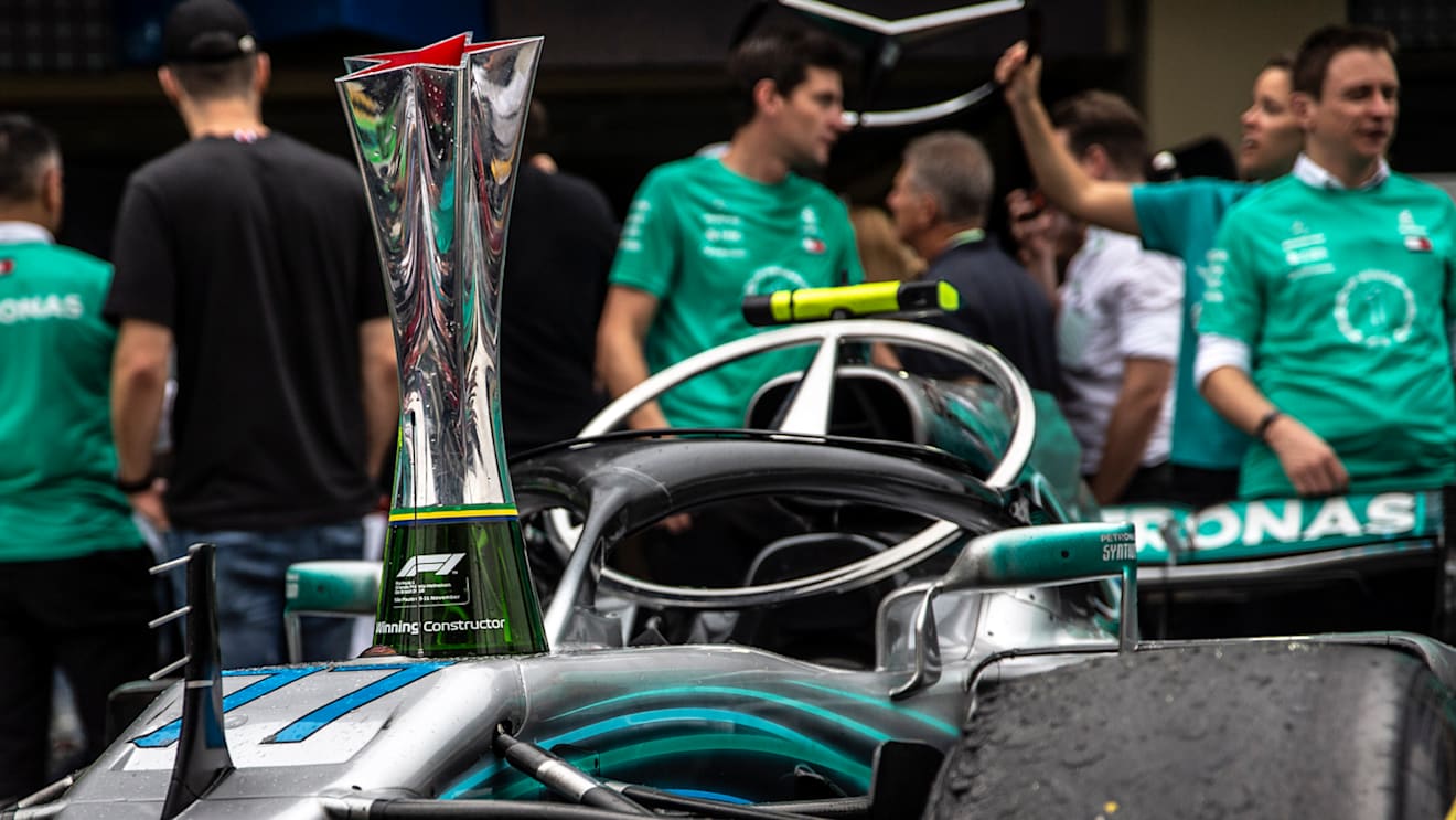 Mercedes-AMG F1 celebrate clinching the Constructors Championship with the trophy during the Brazilian GP at Autódromo José Carlos Pace on November 11, 2018. (Photo by Manuel Goria / Sutton Images)