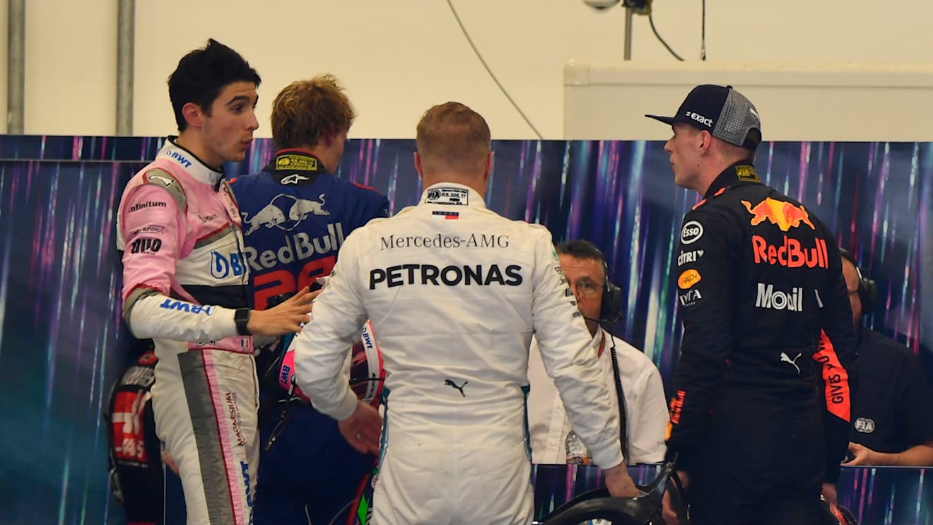 Max Verstappen, Red Bull Racing and Esteban Ocon, Racing Point Force India square up after the race following their on track crash during the Brazilian GP on November 11, 2018 in Autodromo Jose Carlos Pace, Brazil. (Photo by Sutton Images)