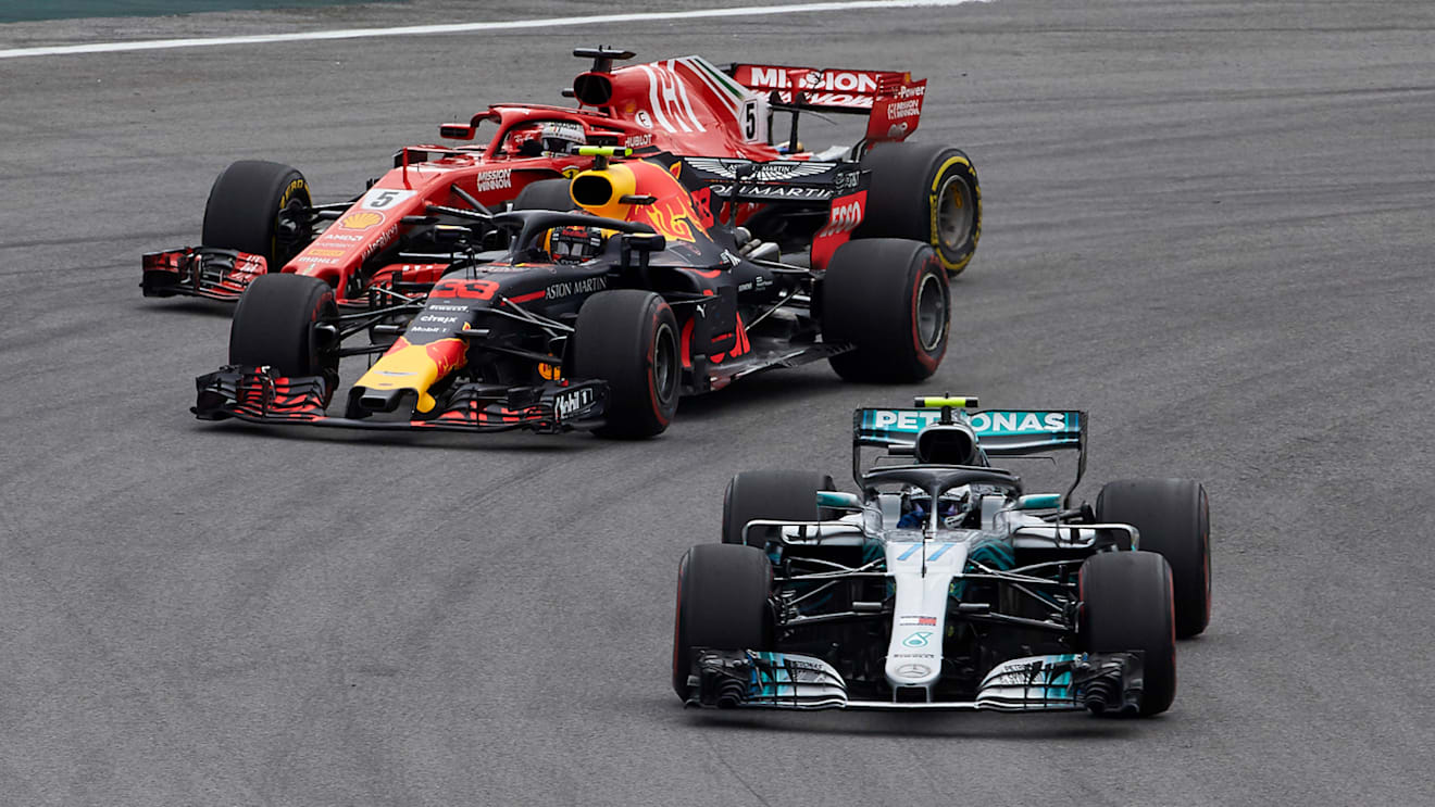 Valtteri Bottas, Mercedes AMG F1 W09 EQ Power+, leads Max Verstappen, Red Bull Racing RB14, and Sebastian Vettel, Ferrari SF71H during the Brazilian GP at Autódromo José Carlos Pace on November 11, 2018. (Photo by Steve Etherington / LAT Images)