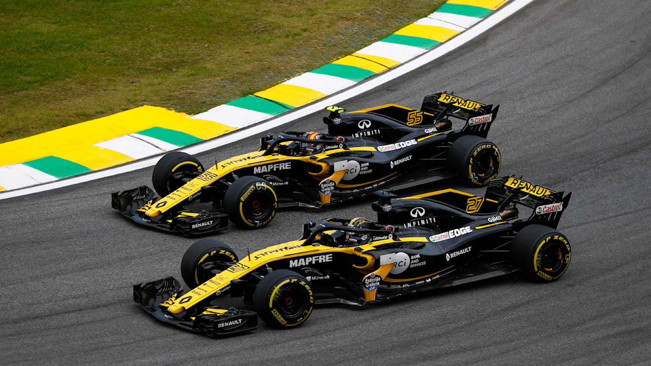 Nico Hulkenberg, Renault Sport F1 Team R.S. 18, battles with Carlos Sainz Jr., Renault Sport F1 Team R.S. 18 during the Brazilian GP on November 11, 2018 in Autodromo Jose Carlos Pace, Brazil. (Photo by Glenn Dunbar / LAT Images)