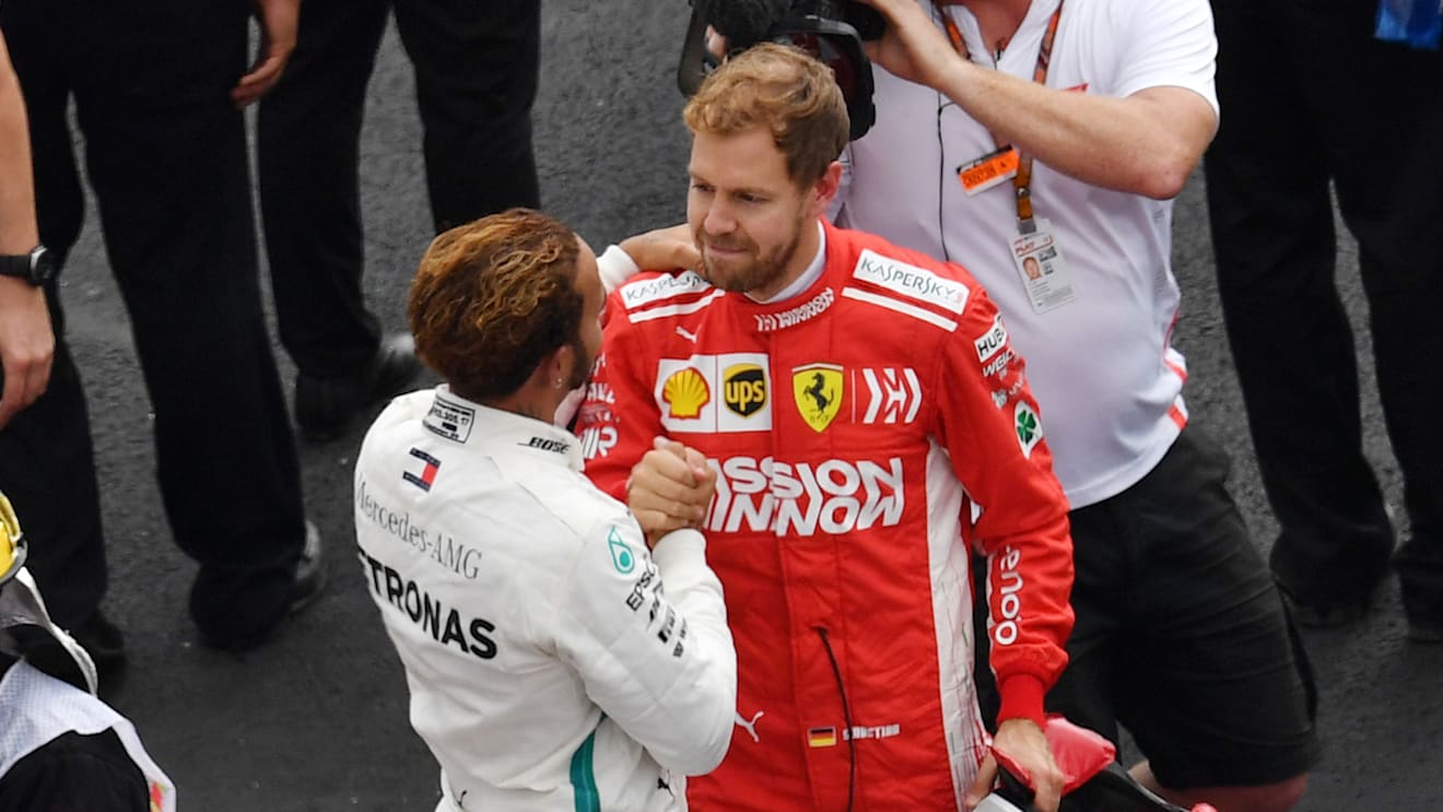 AUTODROMO HERMANOS RODRIGUEZ, MEXICO - OCTOBER 28: Lewis Hamilton, Mercedes AMG F1 and Sebastian Vettel, Ferrari celebrate in Parc Ferme during the Mexican GP at Autodromo Hermanos Rodriguez on October 28, 2018 in Autodromo Hermanos Rodriguez, Mexico. (Photo by Jerry Andre / Sutton Images)