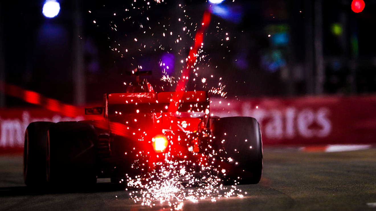 SINGAPORE STREET CIRCUIT, SINGAPORE - SEPTEMBER 15: Sebastian Vettel, Ferrari SF71H during the Singapore GP at Singapore Street Circuit on September 15, 2018 in Singapore Street Circuit, Singapore. (Photo by Zak Mauger / LAT Images)