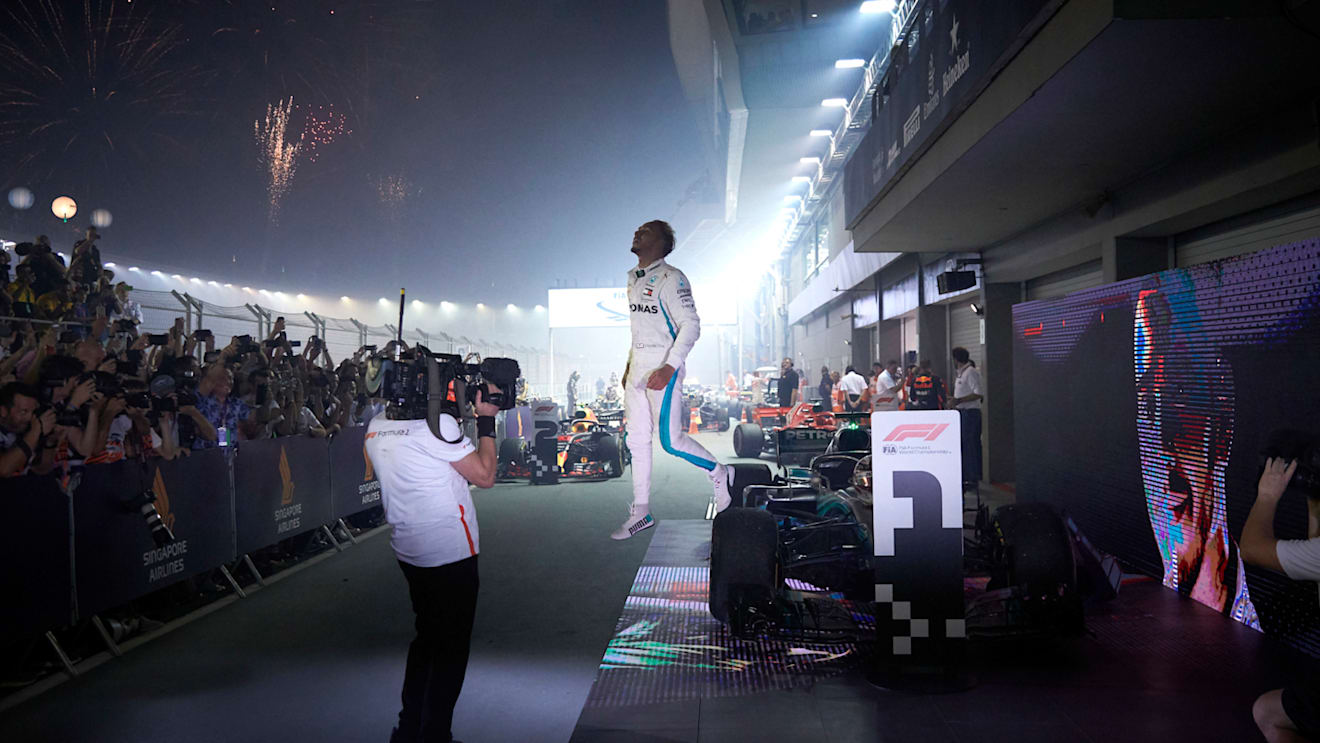 SINGAPORE STREET CIRCUIT, SINGAPORE - SEPTEMBER 16: Lewis Hamilton, Mercedes AMG F1, 1st position, arrives in Parc Ferme after the race during the Singapore GP at Singapore Street Circuit on September 16, 2018 in Singapore Street Circuit, Singapore. (Photo by Steve Etherington / LAT Images)