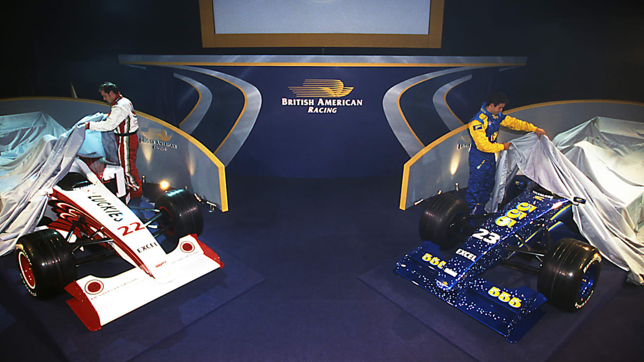 Jacques Villeneuve (CDN) and Riccardo Zonta (BRA) take the covers off their dual-liveried cars at British American Racing's 1999 Launch, BAR Factory, Brackley, England, 6 January 1999. © Sutton Motorsport Images