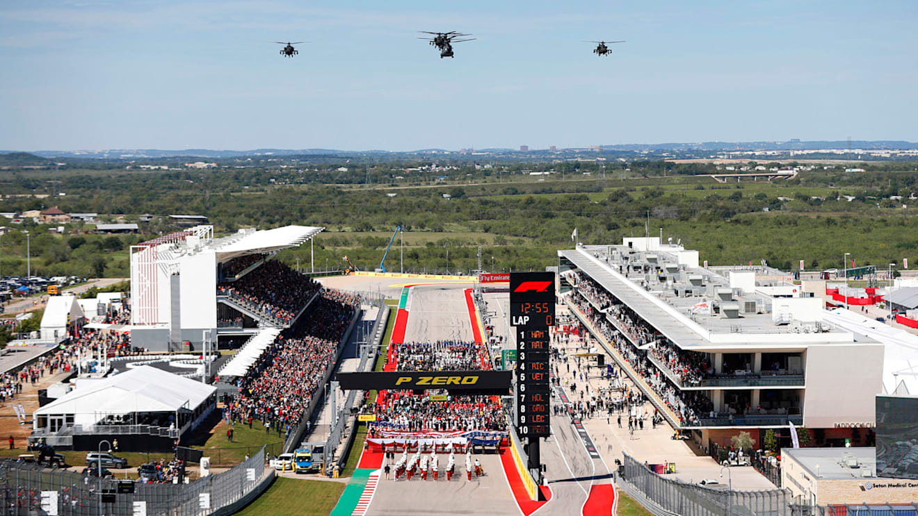 CIRCUIT OF THE AMERICAS, UNITED STATES OF AMERICA - OCTOBER 21: Three Boeing AH-64E Apache gunship helicopters with a pair of Boeing CH-47F Chinook transports from the Dutch Air Force 302 Training Squadron (Fort Hood) fly over the grid during the United States GP at Circuit of the Americas on October 21, 2018 in Circuit of the Americas, United States of America. (Photo by Joe Portlock / LAT Images