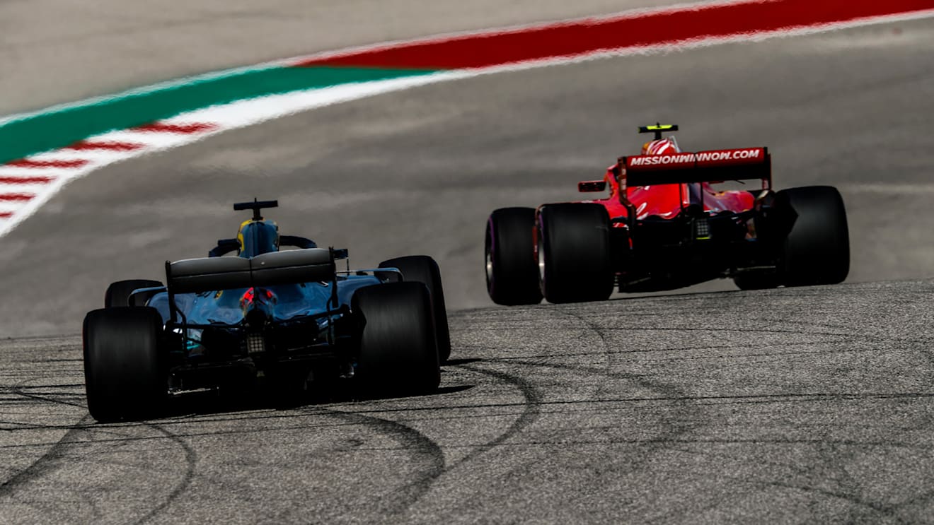 CIRCUIT OF THE AMERICAS, UNITED STATES OF AMERICA - OCTOBER 21: Kimi Raikkonen, Ferrari SF71H, leads Lewis Hamilton, Mercedes AMG F1 W09 EQ Power+ during the United States GP at Circuit of the Americas on October 21, 2018 in Circuit of the Americas, United States of America. (Photo by Glenn Dunbar)