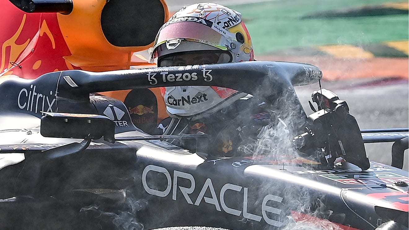 MONZA, ITALY - SEPTEMBER 12: Max Verstappen of the Netherlands driving the (33) Red Bull Racing RB16B Honda and Lewis Hamilton of Great Britain driving the (44) Mercedes AMG Petronas F1 Team Mercedes W12 crash during the F1 Grand Prix of Italy at Autodromo di Monza on September 12, 2021 in Monza, Italy. 