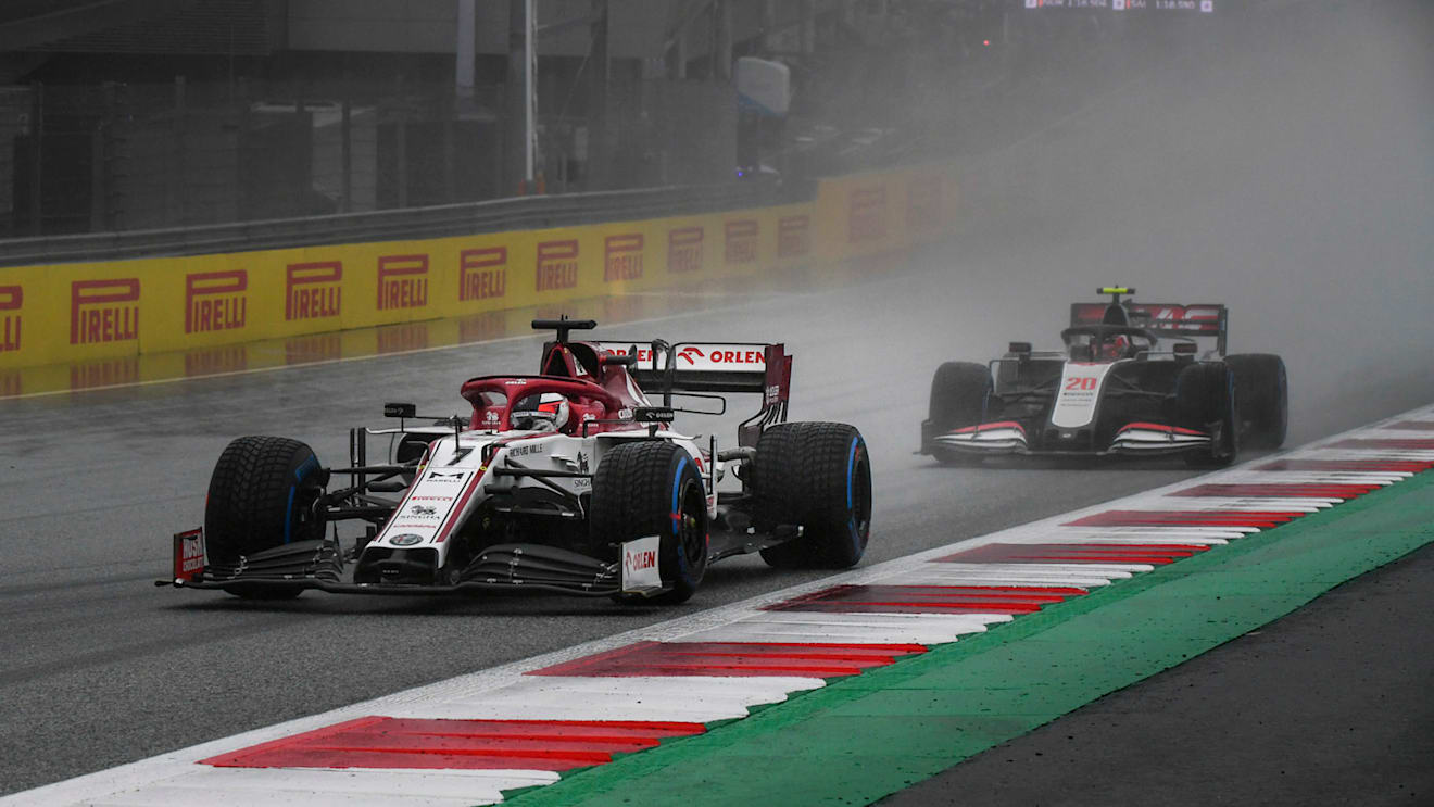 Kimi Raikkonen, Alfa Romeo Racing C39, leads Kevin Magnussen, Haas VF-20