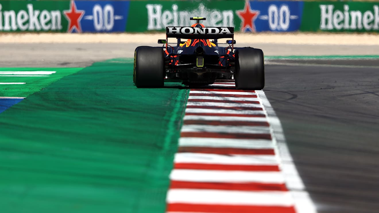 Whereas Red Bull's Portugal-spec diffuser had a narrower central section with some outer elements moved upwards too