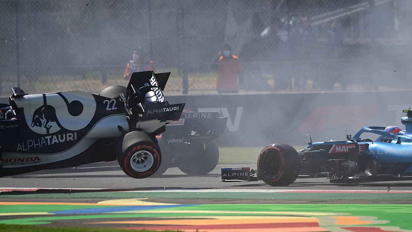 Tsunoda Mexico Crash AlphaTauri's Japanese driver Yuki Tsunoda (L) crashes during the Formula One Mexico Grand Prix at the Hermanos Rodriguez racetrack in Mexico City on November 7, 2021. (Photo by PEDRO PARDO / AFP) (Photo by PEDRO PARDO/AFP via Getty Images)2.jpg