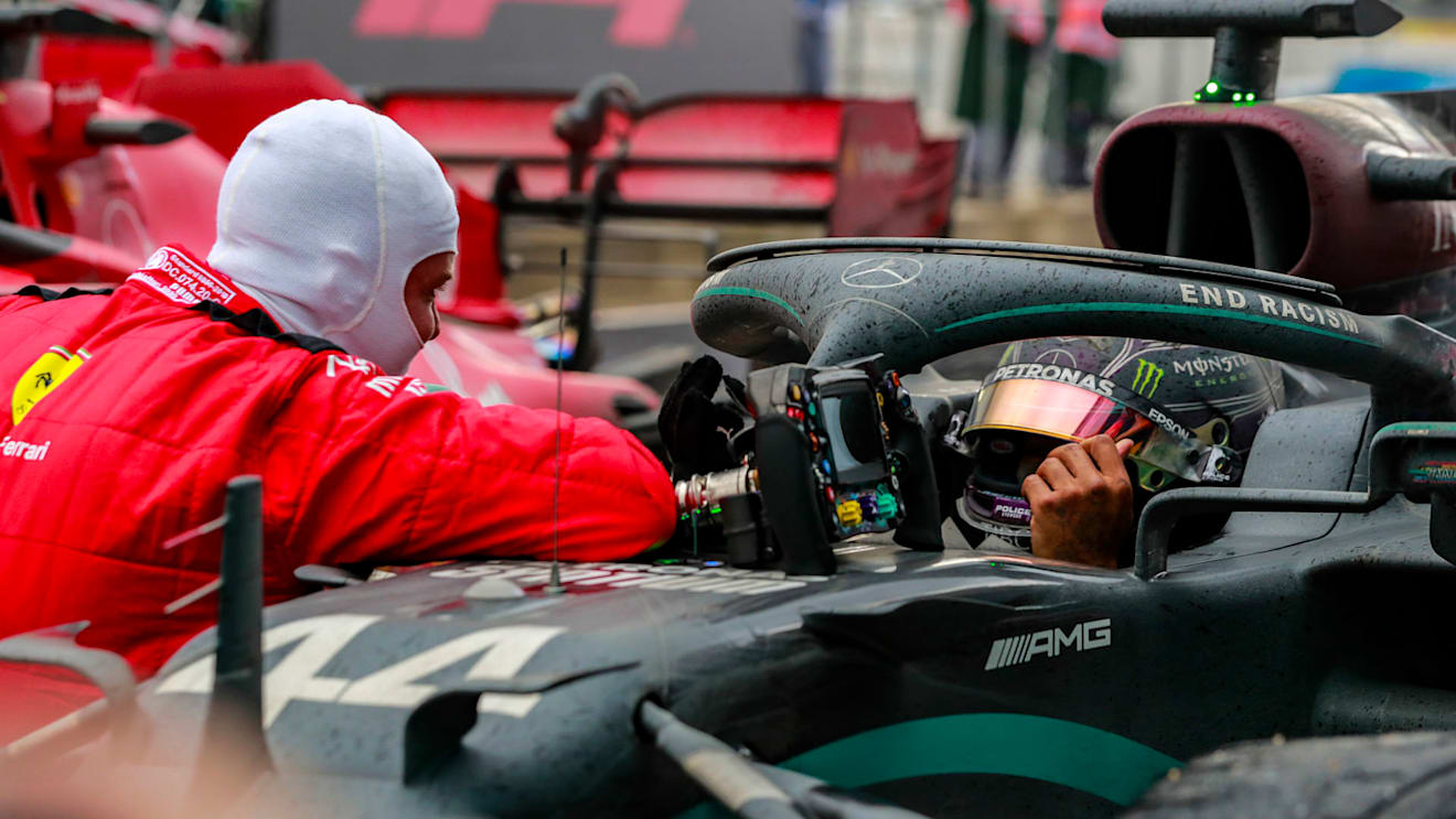 Sebastian Vettel, Ferrari, 3rd position, congratulates Lewis Hamilton, Mercedes-AMG Petronas F1, 1st position, in Parc Ferme after the latter secured his 7th world drivers title