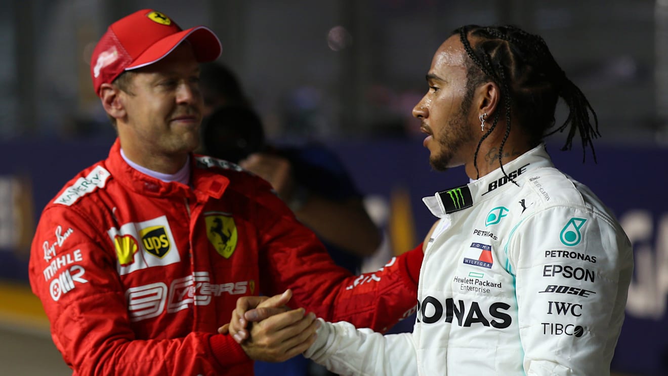 Sebastian Vettel (GER) Ferrari SF90 and Lewis Hamilton (GBR) Mercedes AMG F1 W10.
21.09.2019. Formula 1 World Championship, Rd 15, Singapore Grand Prix, Marina Bay Street Circuit, Singapore, Qualifying Day.
- www.xpbimages.com, EMail: requests@xpbimages.com - copy of publication required for printed pictures. Every used picture is fee-liable. © Copyright: Batchelor / XPB Images