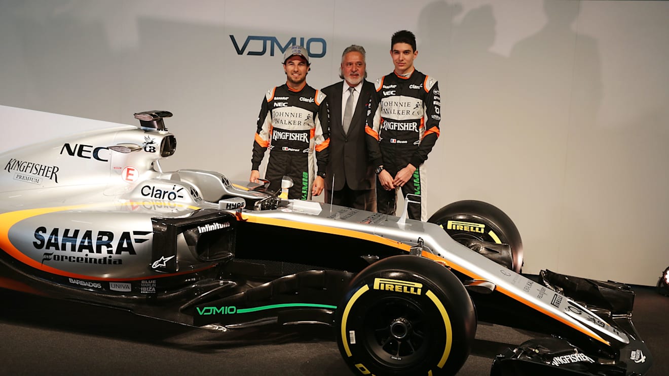 (L to R): Sergio Perez (MEX) with Dr. Vijay Mallya (IND) Sahara Force India F1 Team Owner and Esteban Ocon (FRA). Sahara Force India F1 VJM10 Launch, Wednesday 22nd February 2017. Silverstone, England. © Sahara Force India