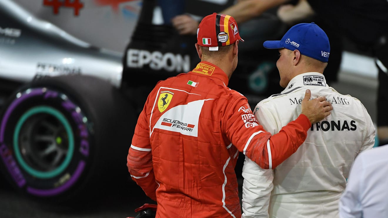Pole sitter Bottas (FIN) Mercedes AMG F1 and Vettel (GER) Ferrari in parc ferme at Formula One World Championship, Rd20, Abu Dhabi Grand Prix, Qualifying, Yas Marina Circuit, Abu Dhabi, UAE, Saturday 25 November 2017. © Mark Sutton/Sutton Images