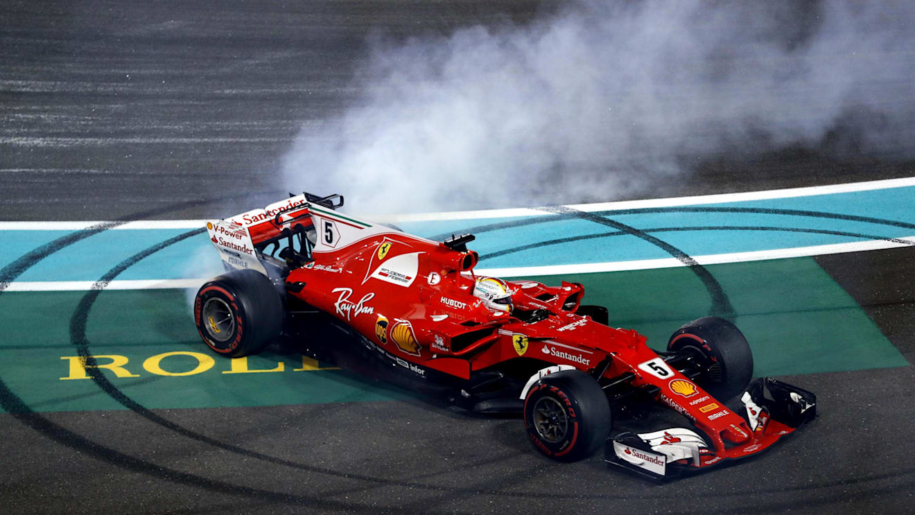 Sebastian Vettel (GER) Ferrari SF70-H celebrates and performs donuts in parc ferme at Formula One World Championship, Rd20, Abu Dhabi Grand Prix, Race, Yas Marina Circuit, Abu Dhabi, UAE, Sunday 26 November 2017. © Lionel Ng/Sutton Images