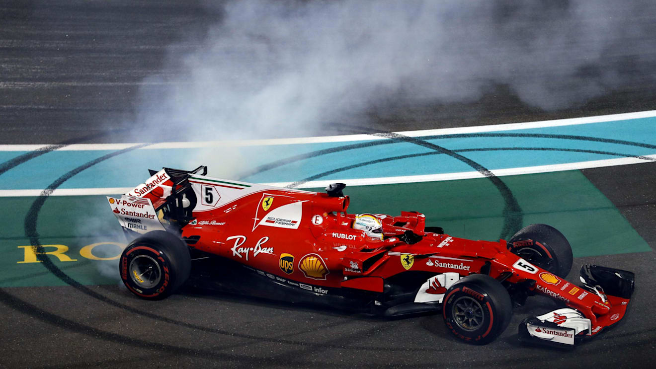 Sebastian Vettel (GER) Ferrari SF70-H celebrates and performs donuts in parc ferme at Formula One World Championship, Rd20, Abu Dhabi Grand Prix, Race, Yas Marina Circuit, Abu Dhabi, UAE, Sunday 26 November 2017. © Lionel Ng/Sutton Images