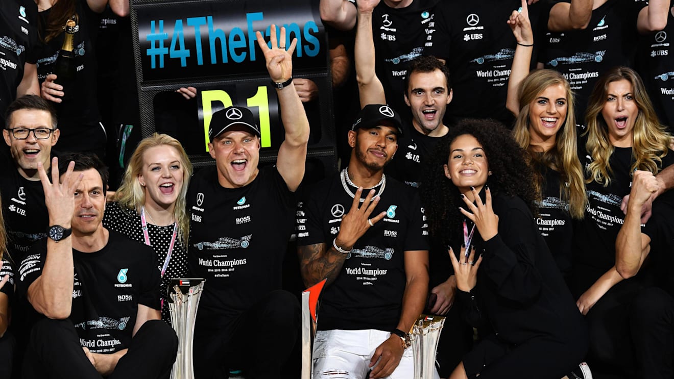 Toto Wolff (AUT) Mercedes AMG F1 Director of Motorsport, Valtteri Bottas (FIN) Mercedes AMG F1 and wife Emilia Pikkarainen (FIN) with Lewis Hamilton (GBR) Mercedes AMG F1 at the team celebratrations at Formula One World Championship, Rd20, Abu Dhabi Grand Prix, Race, Yas Marina Circuit, Abu Dhabi, UAE, Sunday 26 November 2017. © Mark Sutton/Sutton Images