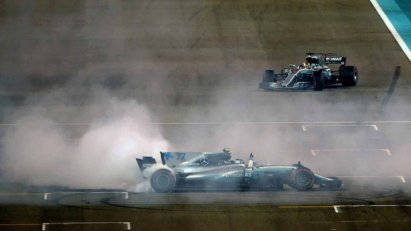 Race winner Valtteri Bottas (FIN) Mercedes-Benz F1 W08 Hybrid celebrates in parc ferme with Lewis Hamilton (GBR) Mercedes-Benz F1 W08 Hybrid and performs donuts at Formula One World Championship, Rd20, Abu Dhabi Grand Prix, Race, Yas Marina Circuit, Abu Dhabi, UAE, Sunday 26 November 2017. © Simon Galloway/Sutton Images
