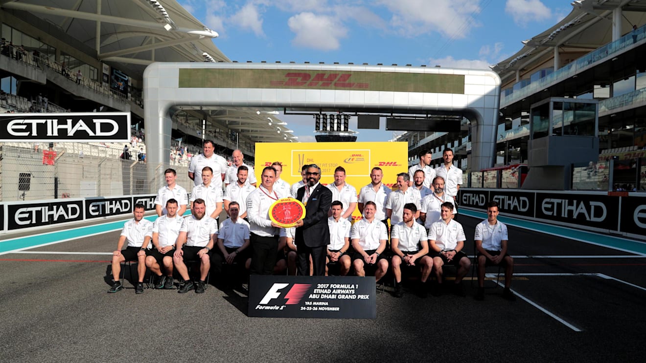 Mercedes AMG F1 are presented with the DHL Fastest Pit Stop Award at Formula One World Championship, Rd20, Abu Dhabi Grand Prix, Race, Yas Marina Circuit, Abu Dhabi, UAE, Sunday 26 November 2017. © James Gasperotti/Sutton Images