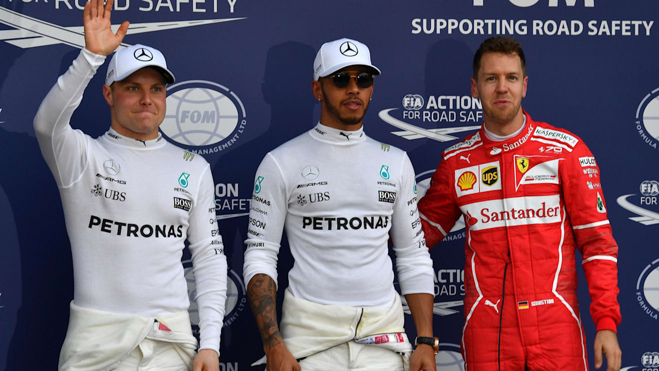 (L to R): Valtteri Bottas (FIN) Mercedes AMG, pole sitter Lewis Hamilton (GBR) Mercedes AMG and Sebastian Vettel (GER) Ferrari celebrate at F1 World Championship, Australian Grand Prix, Melbourne, Australia, 25 March 2017. ©Sutton Motorsport Images