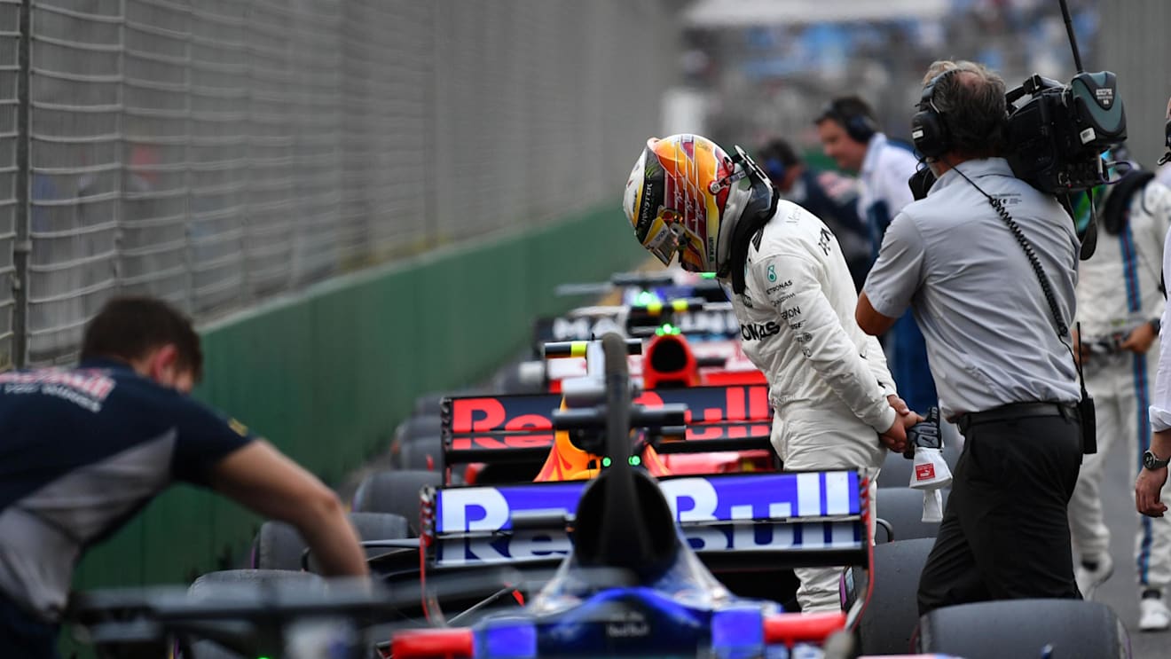 Pole sitter Lewis Hamilton (GBR) Mercedes AMG F1 looks at the Red Bull Racing RB13 in parc ferme at Formula One World Championship, Australian Grand Prix, Qualifying, Albert Park, Melbourne, Australia, Saturday 25 March 2017. © Sutton Motorsport Images