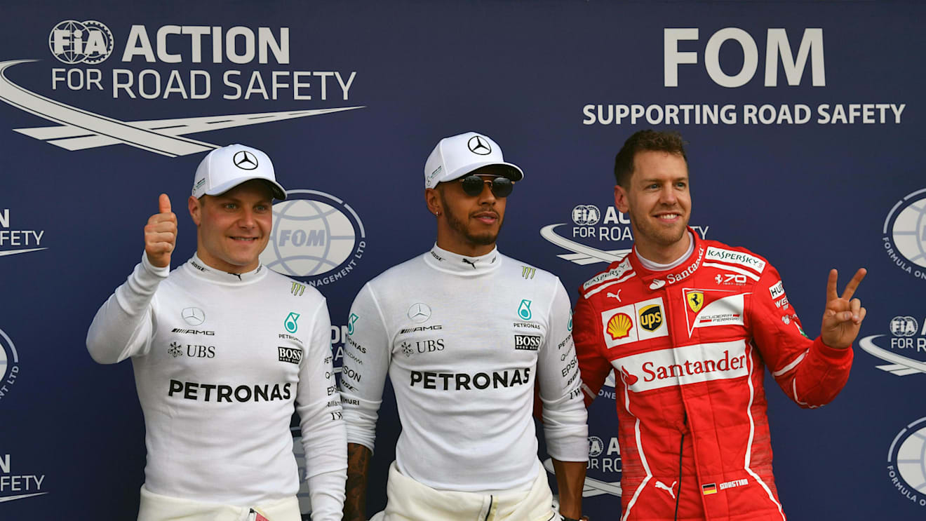 (L to R): Valtteri Bottas (FIN) Mercedes AMG, pole sitter Lewis Hamilton (GBR) Mercedes AMG and Sebastian Vettel (GER) Ferrari celebrate at F1 World Championship, Australian Grand Prix, Melbourne, Australia, 25 March 2017. ©Sutton Motorsport Images