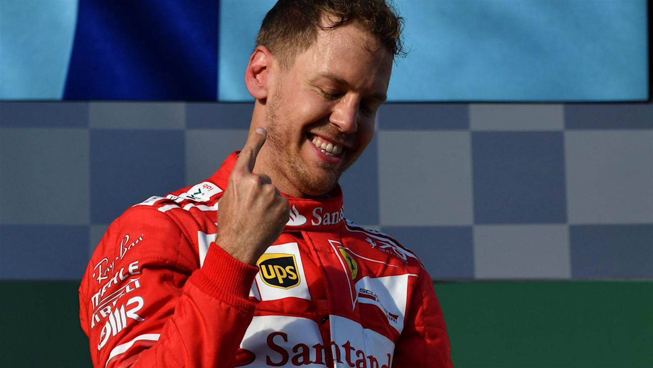 Race winner Sebastian Vettel (GER) Ferrari celebrates on the podium at Formula One World Championship, Rd1, Australian Grand Prix, Practice, Albert Park, Melbourne, Australia, Friday 24 March 2017. © Sutton Motorsport Images