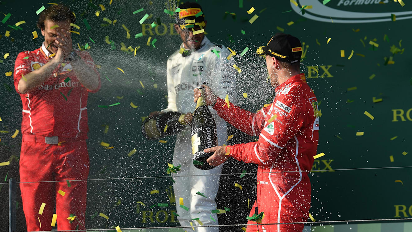 Lewis Hamilton (GBR) Mercedes AMG and Sebastian Vettel (GER) Ferrari celebrate on the podium with the champagne at Formula One World Championship, Australian Grand Prix, Albert Park, Melbourne, Australia, Sunday 26 March 2017. © Sutton Motorsport Images