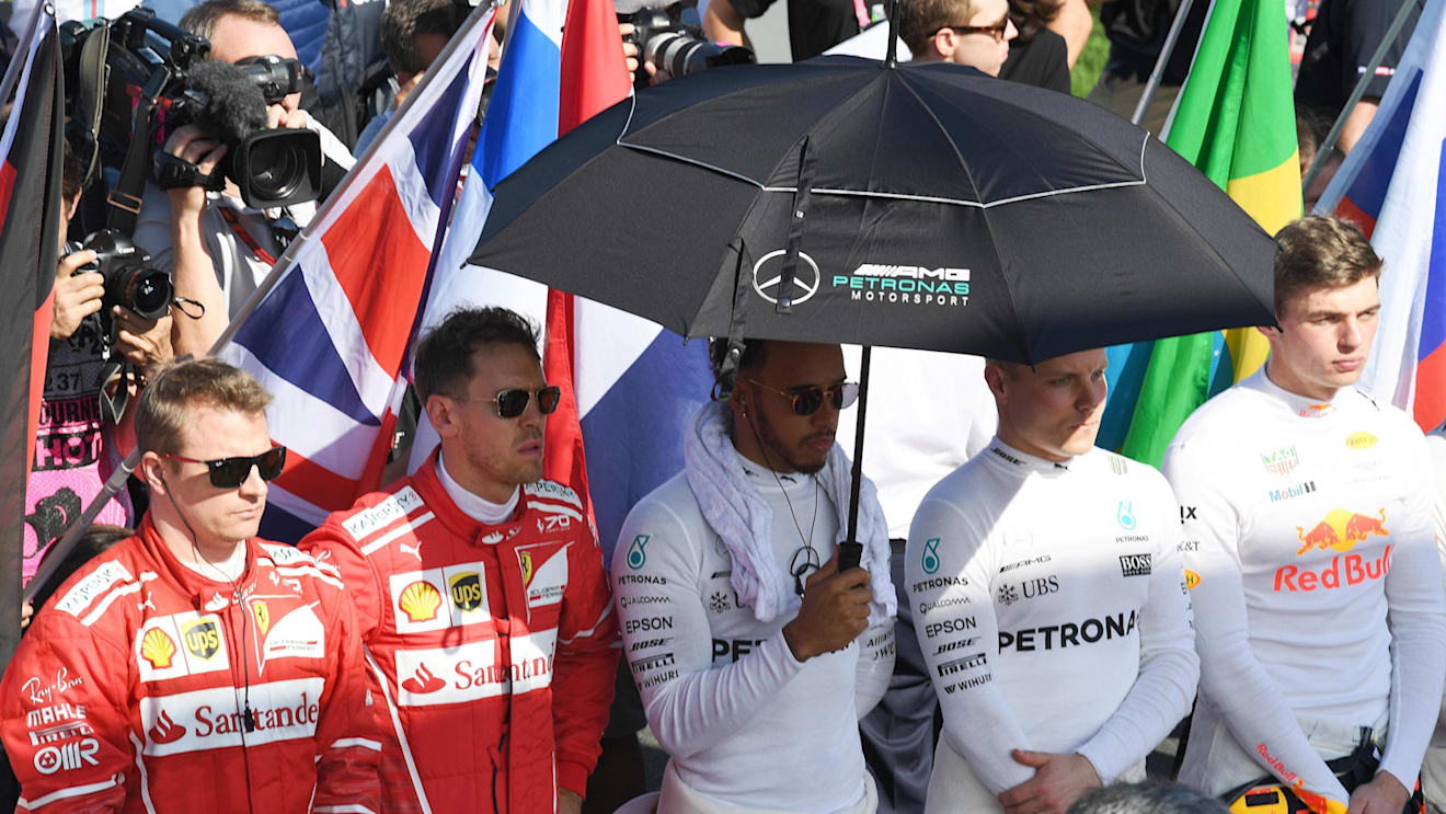 (L to R): Kimi Raikkonen (FIN), Sebastian Vettel (GER), Lewis Hamilton (GBR) and Valtteri Bottas (FIN) on the grid at F1 World Championship, Australian Grand Prix, Melbourne, Australia, 26 March 2017. ©Sutton Motorsport Images