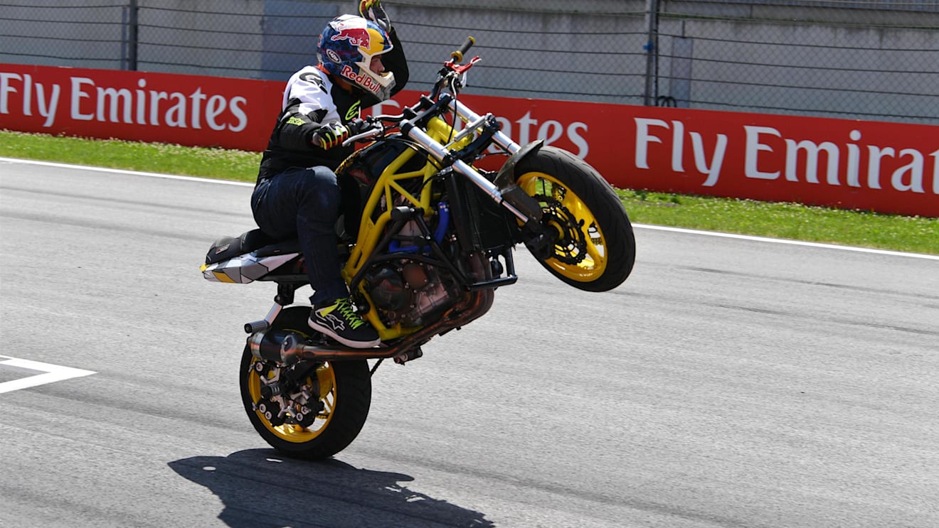 Motorbike stunt rider at Formula One World Championship, Rd9, Austrian Grand Prix, Practice, Spielberg, Austria, Friday 7 July 2017. © Sutton Images