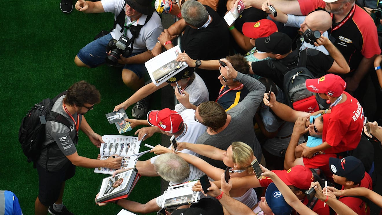 Fernando Alonso (ESP) McLaren signs autographs for the fans at Formula One World Championship, Rd9, Austrian Grand Prix, Qualifying, Spielberg, Austria, Saturday 8 July 2017. © Sutton Images