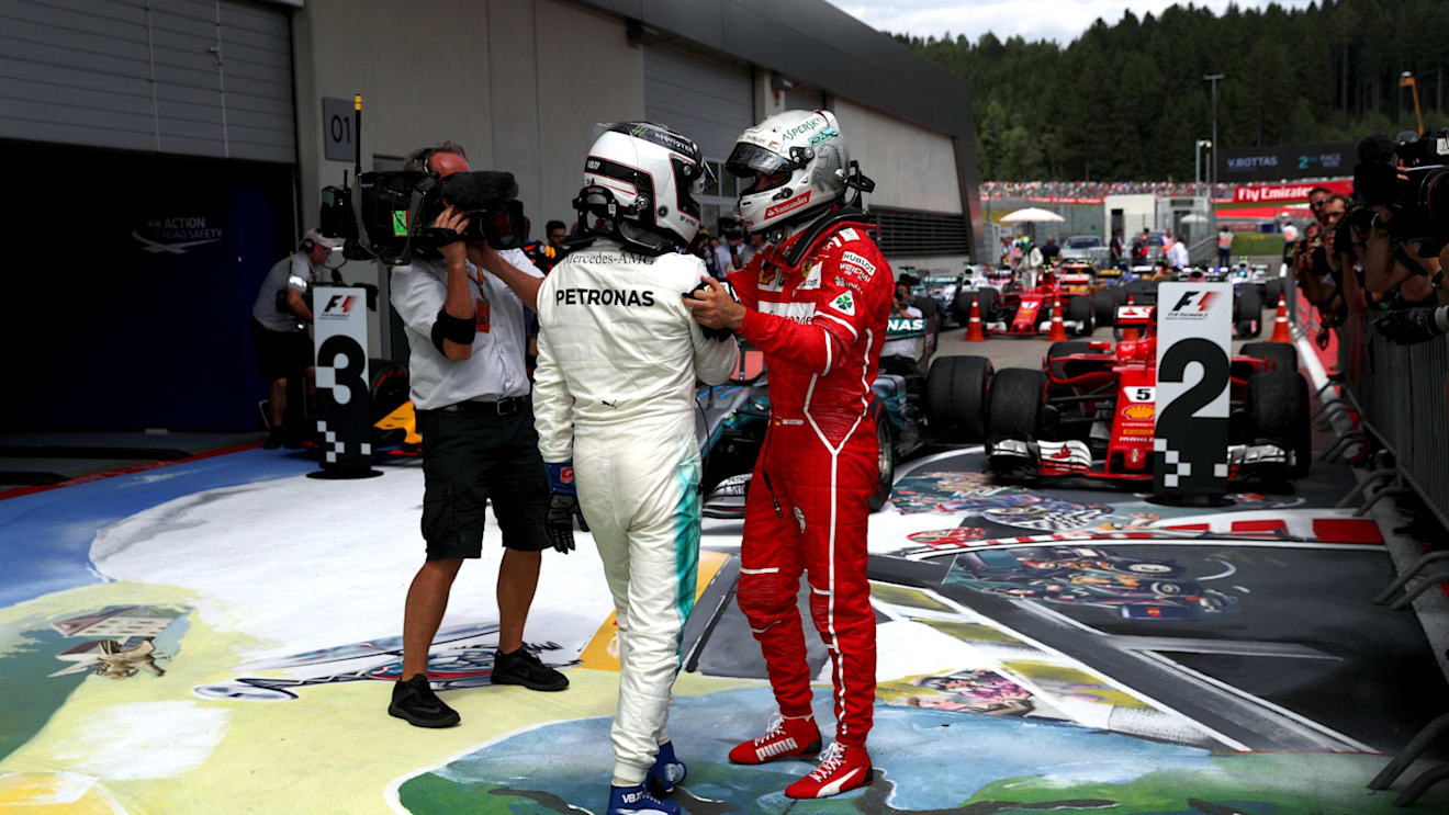 Race winner Valtteri Bottas (FIN) Mercedes AMG F1 celebrates in parc ferme with Sebastian Vettel (GER) Ferrari at Formula One World Championship, Rd9, Austrian Grand Prix, Race, Spielberg, Austria, Sunday 9 July 2017. © Sutton Images