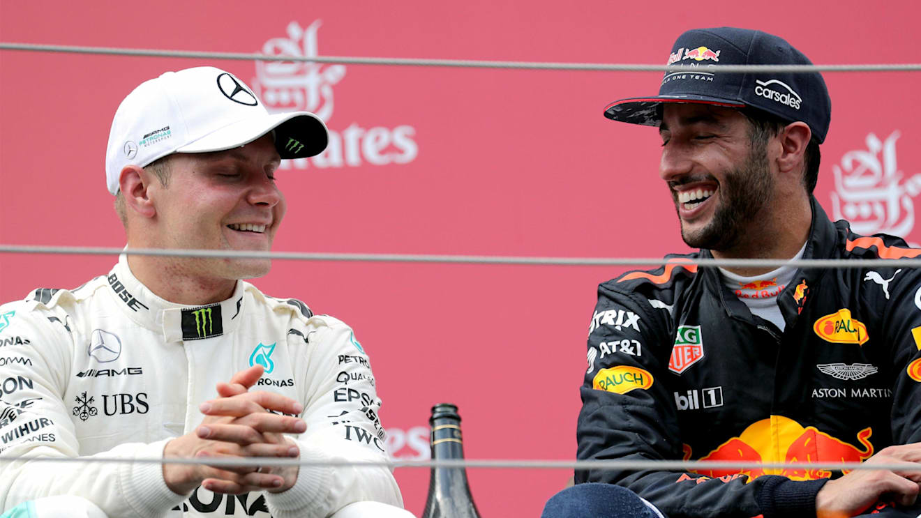 Race winner Valtteri Bottas (FIN) Mercedes AMG F1 celebrates on the podium with Daniel Ricciardo (AUS) Red Bull Racing at Formula One World Championship, Rd9, Austrian Grand Prix, Race, Spielberg, Austria, Sunday 9 July 2017. © Sutton Images