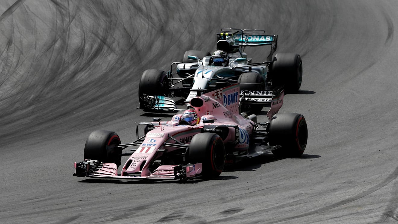 Sergio Perez (MEX) Force India VJM10 and Valtteri Bottas (FIN) Mercedes-Benz F1 W08 Hybrid at Formula One World Championship, Rd9, Austrian Grand Prix, Race, Spielberg, Austria, Sunday 9 July 2017. © Sutton Images
