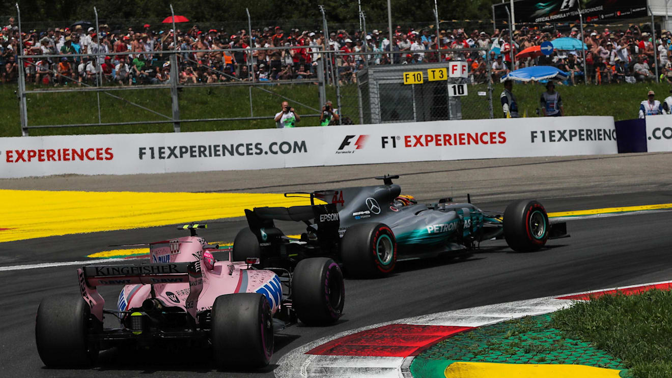 Lewis Hamilton (GBR) Mercedes-Benz F1 W08 Hybrid and Esteban Ocon (FRA) Force India VJM10 at the start of the race at Formula One World Championship, Rd9, Austrian Grand Prix, Race, Spielberg, Austria, Sunday 9 July 2017. © Sutton Images