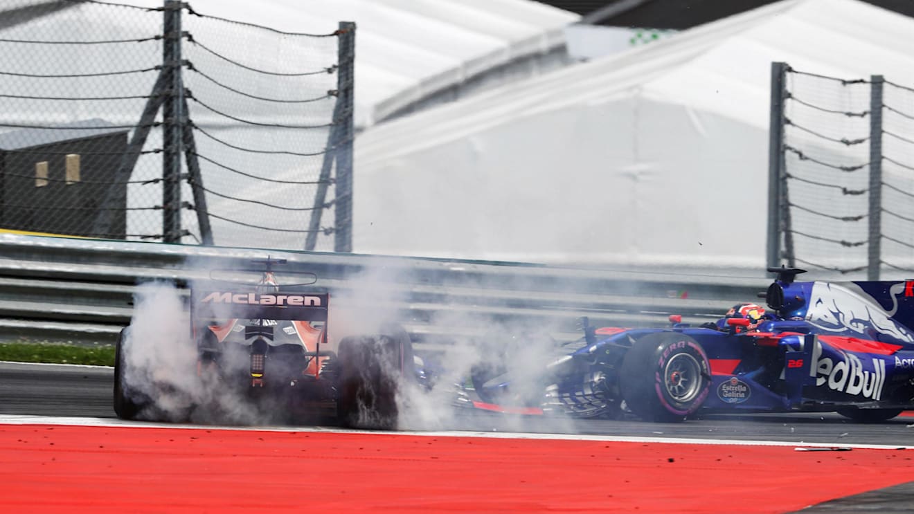 Fernando Alonso (ESP) McLaren MCL32 and Daniil Kvyat (RUS) Scuderia Toro Rosso STR12 collide at the start of the race at Formula One World Championship, Rd9, Austrian Grand Prix, Race, Spielberg, Austria, Sunday 9 July 2017. © Sutton Images