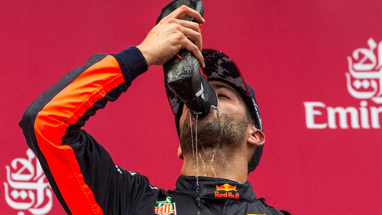 Daniel Ricciardo (AUS) Red Bull Racing celebrates with a shoey on the podium at Formula One World Championship, Rd9, Austrian Grand Prix, Race, Spielberg, Austria, Sunday 9 July 2017. © Sutton Images