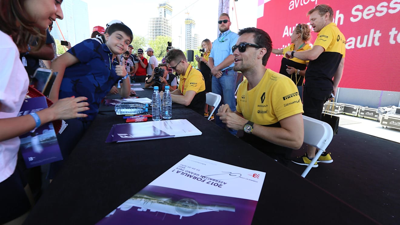 Jolyon Palmer (GBR) Renault Sport F1 Team RS17 signs autographs for the fans at the autograph session at Formula One World Championship, Rd8, Azerbaijan Grand Prix, Qualifying, Baku City Circuit, Baku, Azerbaijan, Saturday 24 June 2017. © Sutton Images