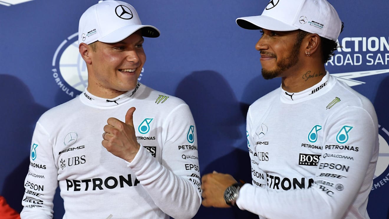 Pole sitter Valtteri Bottas (FIN) Mercedes AMG and Lewis Hamilton (GBR) Mercedes AMG celebrate in parc ferme at F1 World Championship, Bahrain Grand Prix Qualifying, Bahrain International Circuit, Sakhir, Bahrain, 15 April 2017. ©Sutton Motorsport Images