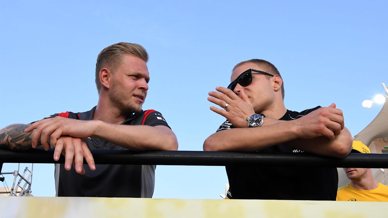 Kevin Magnussen (DEN) Haas F1 and Valtteri Bottas (FIN) Mercedes AMG F1 on the drivers parade at Formula One World Championship, Rd3, Bahrain Grand Prix Race, Bahrain International Circuit, Sakhir, Bahrain, Sunday 16 April 2017. © Sutton Motorsport Images
