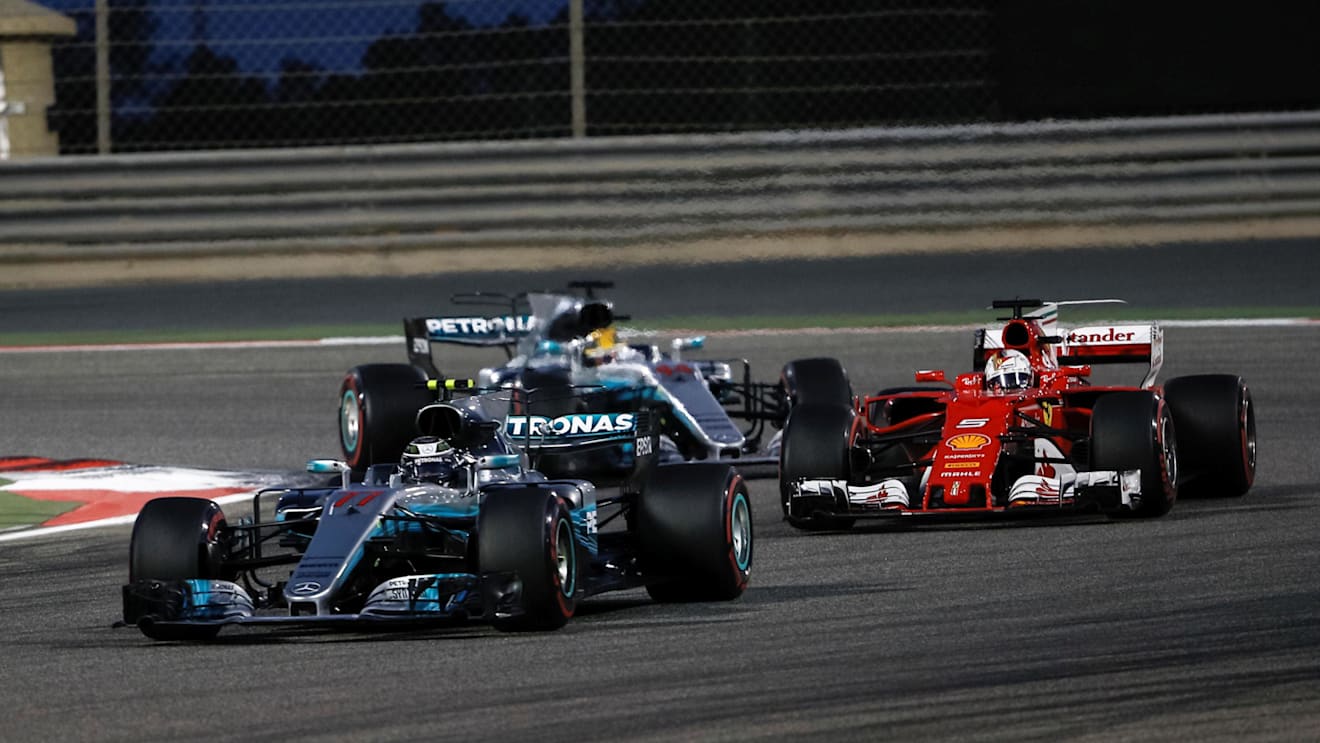 Bottas Mercedes-Benz Hybrid leads Vettel Ferrari and Hamilton Mercedes-Benz Hybrid at Formula One World Championship, Rd3, Bahrain Grand Prix Race, Bahrain International Circuit, Sakhir, Bahrain, Sunday 16 April 2017. © Sutton Motorsport Images