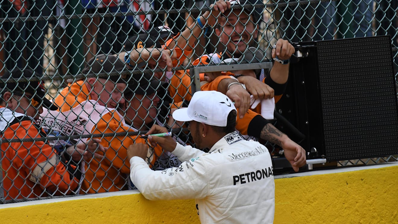 Lewis Hamilton (GBR) Mercedes AMG F1 celebrates in parc ferme and signs autographs for the fans at Formula One World Championship, Rd12, Belgian Grand Prix, Qualifying, Spa Francorchamps, Belgium, Saturday 26 August 2017. © Sutton Images