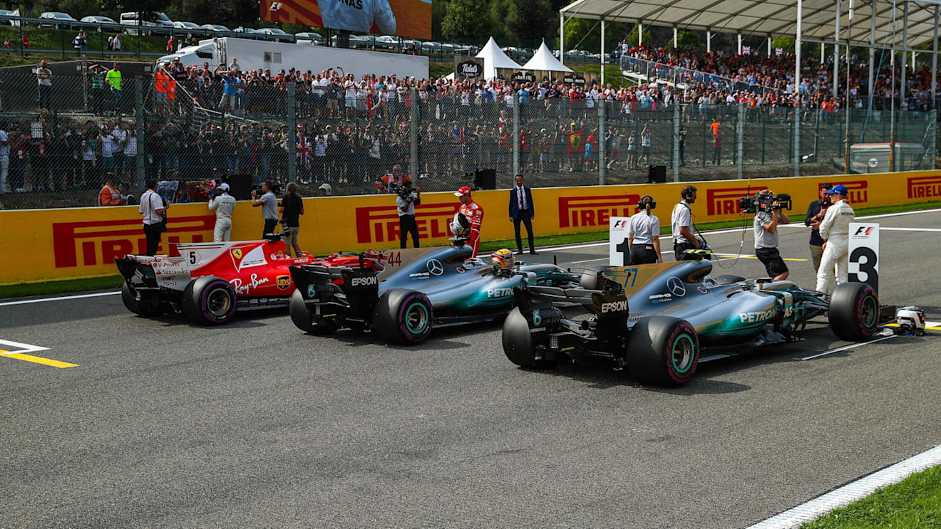 Lewis Hamilton (GBR) Mercedes AMG F1, Sebastian Vettel (GER) Ferrari and Valtteri Bottas (FIN) Mercedes AMG F1 celebrate in parc ferme at Formula One World Championship, Rd12, Belgian Grand Prix, Qualifying, Spa Francorchamps, Belgium, Saturday 26 August