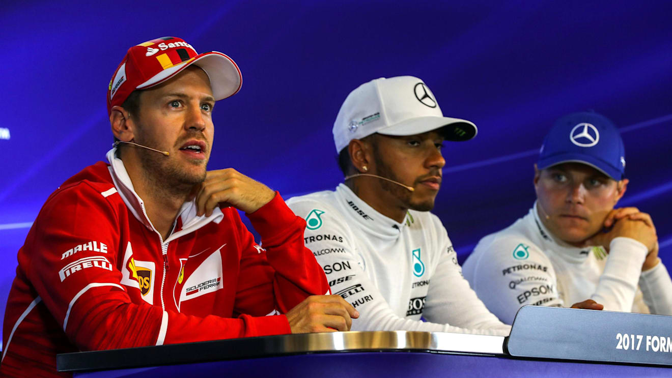 Sebastian Vettel (GER) Ferrari, Lewis Hamilton (GBR) Mercedes AMG F1 and Valtteri Bottas (FIN) Mercedes AMG F1 in the Press Conference at Formula One World Championship, Rd12, Belgian Grand Prix, Qualifying, Spa Francorchamps, Belgium, Saturday 26 August 2017. © Sutton Images