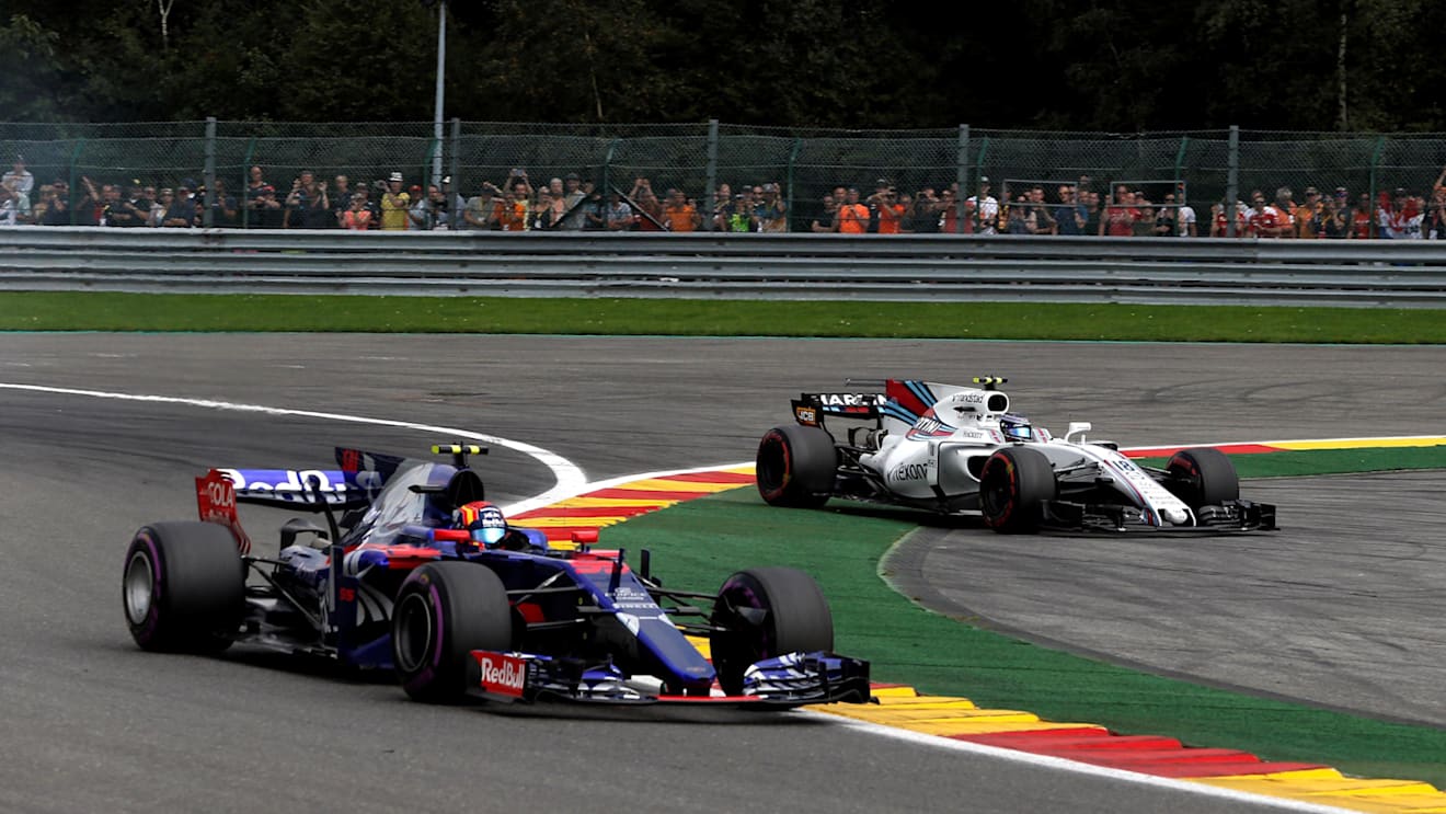 Lance Stroll (CDN) Williams FW40 runs wide alongside Carlos Sainz jr (ESP) Scuderia Toro Rosso STR12 at Formula One World Championship, Rd12, Belgian Grand Prix, Race, Spa Francorchamps, Belgium, Sunday 27 August 2017. © Sutton Images